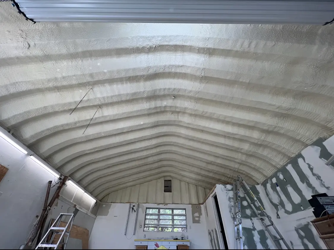 Spray polyurethane foam applied to the underside of a metal roof deck in La Vista